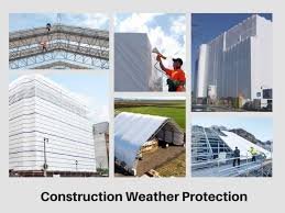 Construction site covered with protective tarps to shield workers and materials from adverse weather conditions.